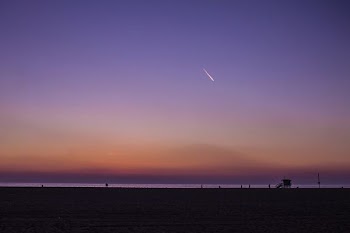 time lapse photography of shooting star