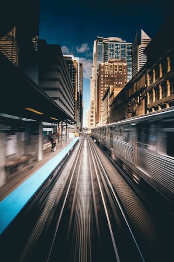 time-lapse photography of train traveling