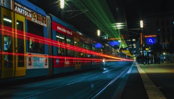 Time-Lapse Photography of Tram During Nighttime