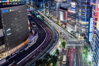 Time-lapse Photography of Vehicles on Road at Night