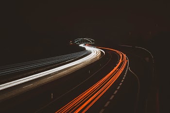 Time Lapse Photography Of Vehicles On Road During Nightime