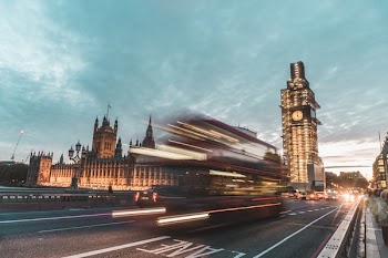 Time-lapse Photography of Vehicles Passing Near Building