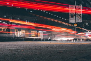 Time-lapse Photography Of Vehicles Passing On Road 