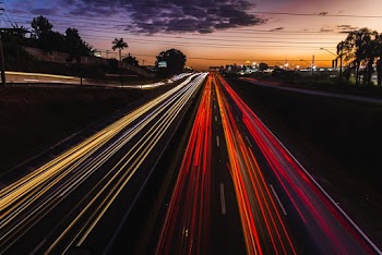 Time-lapse Photography of Vehicles Passing on Road