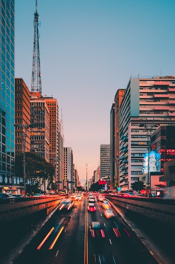 Time Lapse Photography Of Vehicles Passing On Road