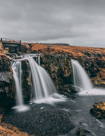 time lapse photography of waterfalls