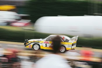 timelapse of sports car on road