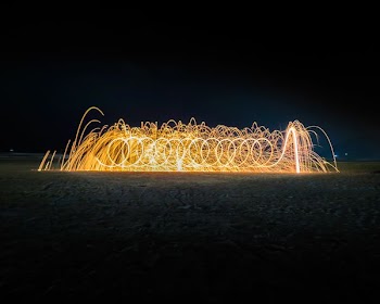 timelapse photography of fire dancers