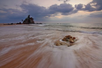 Timelapse Photography of Rock Formation on Seashore