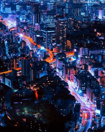 timelapse photography of vehicles and buildings