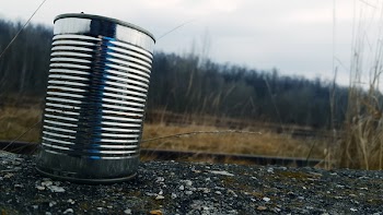 Tin Can on Gravel Surface