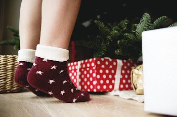 Tiptoe In Front Of Christmas Tree
