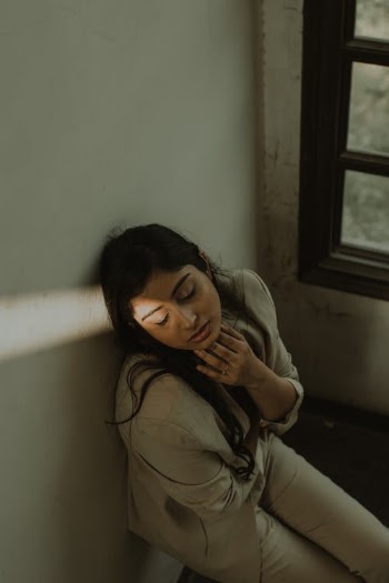 Tired Indian woman with eyes closed · Free Stock Photo
