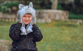 Toddler's Wearing Wolf Headgear