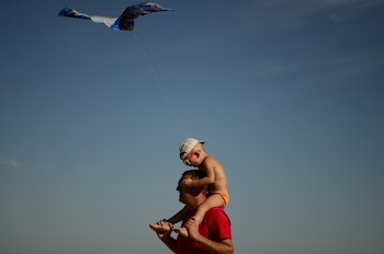Toddler Boy On Man's Shoulder