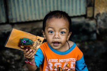 Toddler Carrying Souvenir Pack