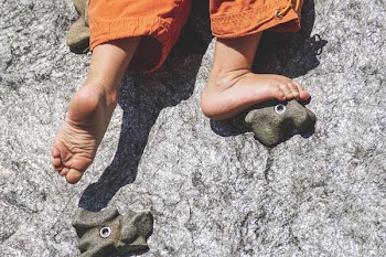 Toddler Climbing on Wall