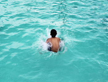 Toddler in Body of Water