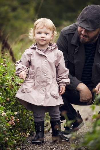 Toddler Standing Beside Man