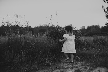 Toddler Standing on Grass