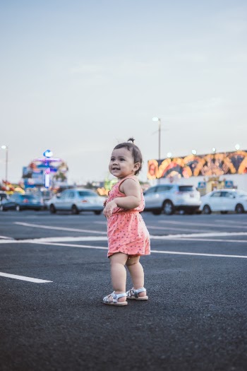 Toddler Standing on Open Area