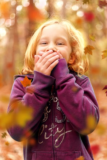 Toddler Wearing Purple Sweatshirt