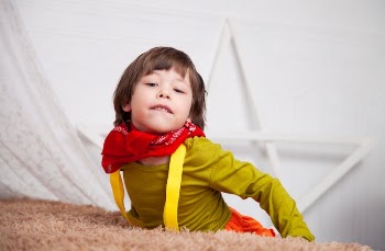 Toddler Wearing Red Scarf