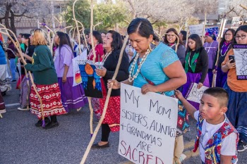 Tohono Indian Women led the Tucson 2019 Women’s March with a show of strength, resilience and power.  This woman’s sign said:  My Mom, Sisters, Aunties and Grandmas are sacred.  Her son was by her side.

International Women’s Day