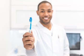 Toothbrush And Dentist