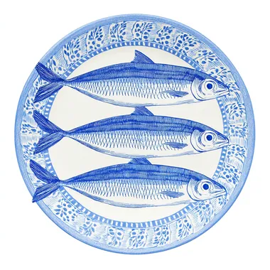 Top View of Three Sardines on Decorative Plate Top View of Three Sardines on Decorative Plate