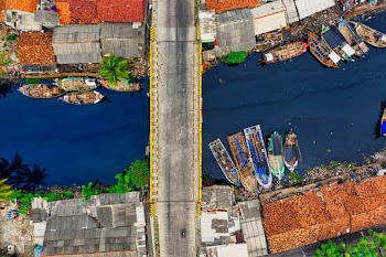 Top View Photo of Boats Near Bridge