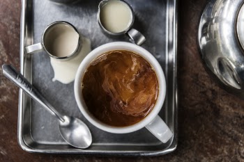 Top View Photo of Coffee Near Spoon