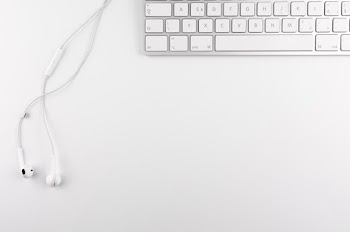 Top View Photo of Keyboard Near Earphone · Free Stock Photo