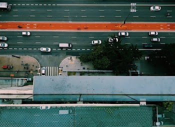 Top View Photo of Vehicles Driving on Road