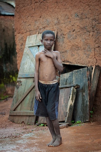 Topless Boy Wearing Black Shorts 