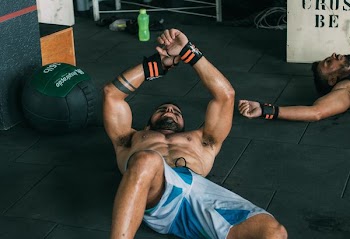 topless man doing exercise