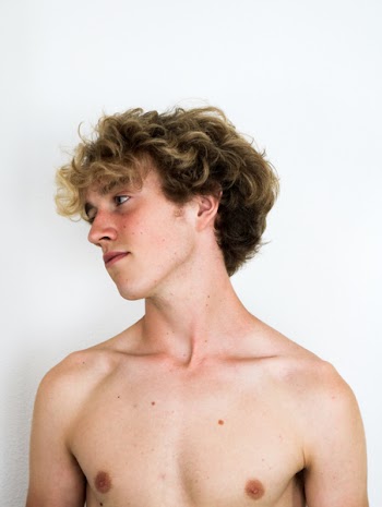 Topless Man Facing Right Side