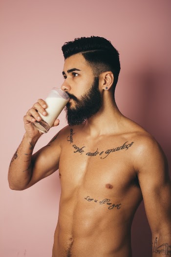 Topless Man Holding Drinking Glass
