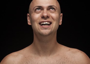 Topless Man Looking Up