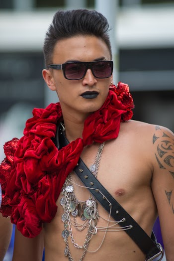 Topless Man Wearing Black Framed Sunglasses