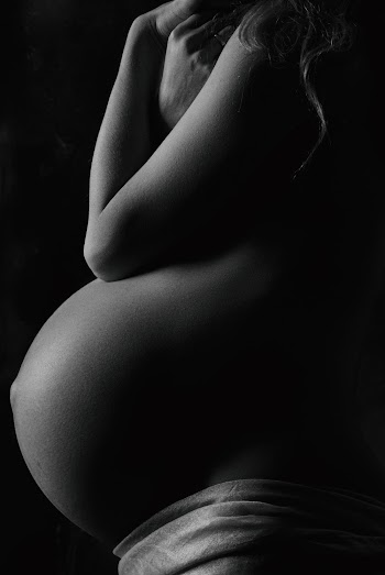 Topless Pregnant Woman