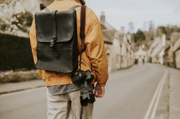 Tourist walking into the village | Free Photo - rawpixel