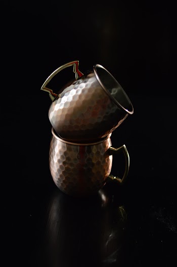Tow Brass Mugs Stack on Top