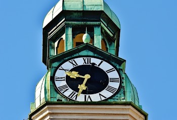 Tower Clock Under Blue Sky during Daytime