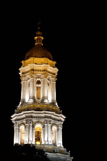 Tower of a church illuminated by night