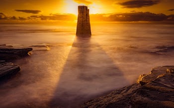 Tower Surrounded With Clouds