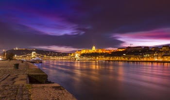 Town Near River During Night Time