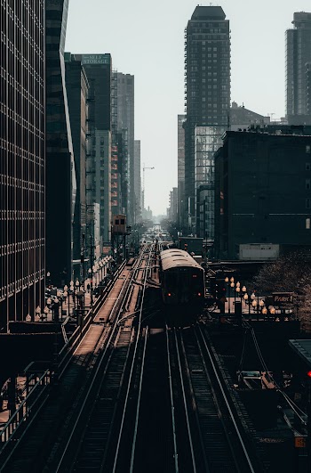 Train Between Buildings
