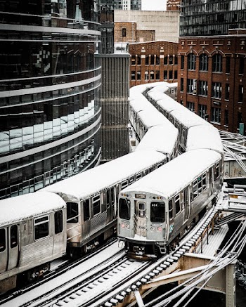 Train Passing by Buildings