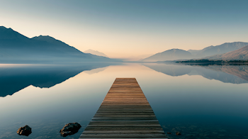 Tranquil Alpine Lake at Sunrise